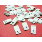10 woven labels "P" (white background)